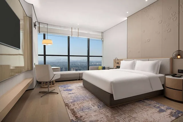غرفة ديلوكس بسرير كينج بإطلالة على المدينة للمدخنين، Wyndham Foshan Nanhai 1/2