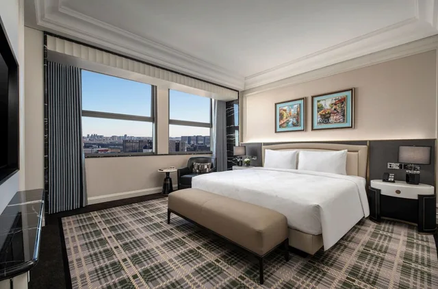 جناح ديلوكس بسرير كينج بمنطقة جلوس مع دخول الصالة في طابق مرتفع، PULLMAN BEIJING SOUTH 3/10