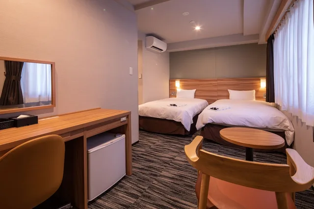 غرفة عائلية بسريرين منفصلين في الملحق، Central Hotel Takeo 2/3