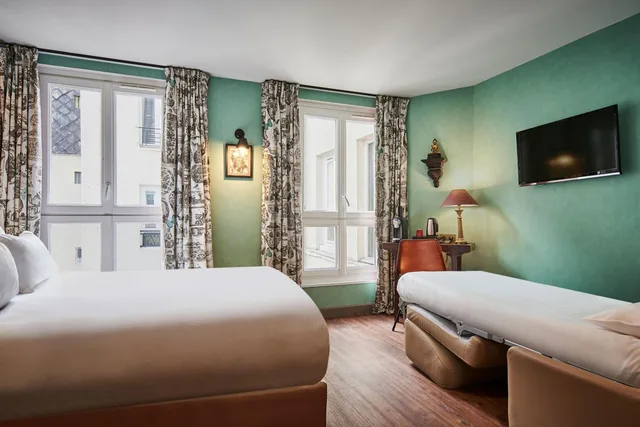 غرفة سوبيريور ثلاثية بسرير كوين مع أريكة، R Kipling Hotel by Happyculture 1/2