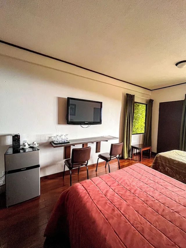 غرفة قياسية بسرير مزدوج وسرير فردي بإطلالة على الحديقة، Hotel de Montana Monteverde 9/10