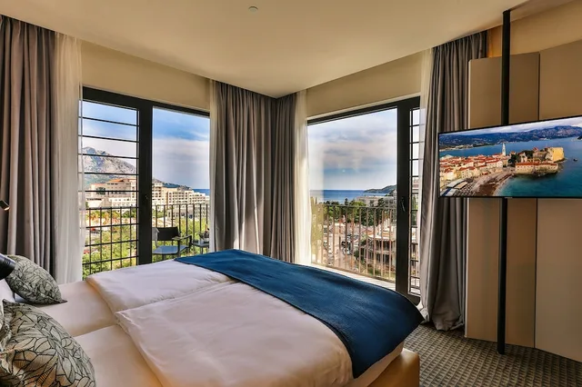 غرفة عائلية رباعية بسرير كينج بإطلالة على البحر مع أريكة، Hotel Kalos 1/5