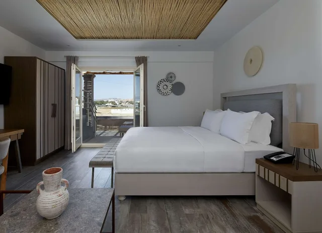 Junior Suite, King Bed, Outdoor Jetted Tub، Sea Breeze Santorini Beach Resort, Curio by Hilton 2/3