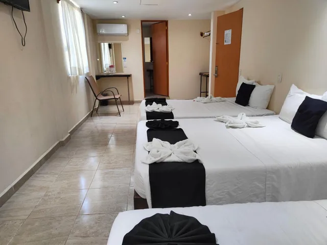 غرفة قياسية ثلاثية بسريرين مزدوجين، Hotel Ashly Loma Larga 2/5
