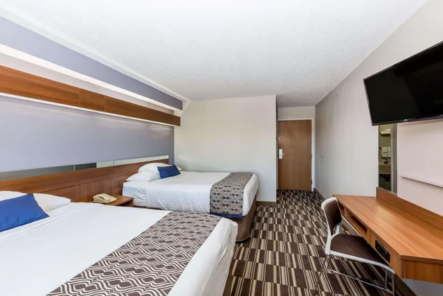 غرفة رباعية بسريرين كوين، Microtel Inn Suites By Wyndham Sioux Falls 1/5