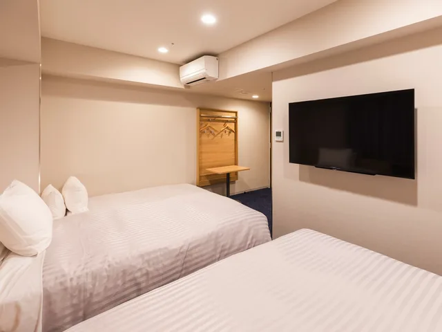 غرفة ثلاثية بسريرين منفصلين مع أريكة، Sotetsu Fresa Inn Nagoya-Shinkansenguchi 2/3