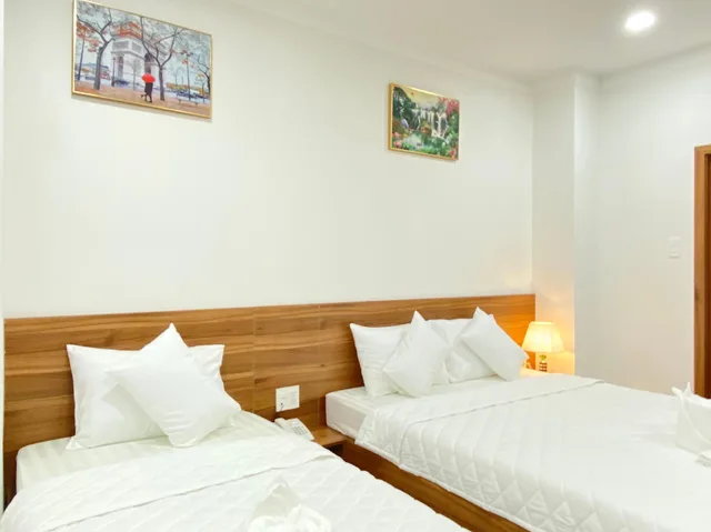 غرفة قياسية ثلاثية بسرير كوين وسرير فردي، Thien Tai Hotel 1/1