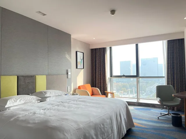 غرفة بسريرين منفصلين وسرير كينج، Holiday Inn Express Zhengzhou Zhengdong 1/6