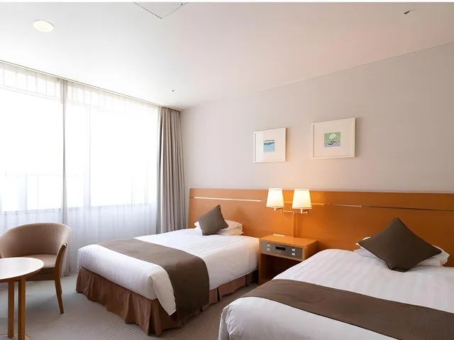 غرفة قياسية بسريرين منفصلين بحوض استحمام في طابق منخفض في المبنى الرئيسي، MEITETSU TOYOTA HOTEL 1/1