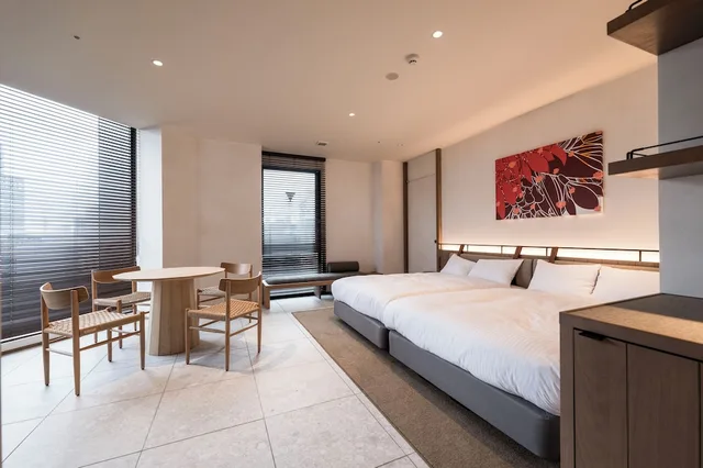 غرفة حصرية رباعية بسريرين مزدوجين، CINQS Hotel 1/5