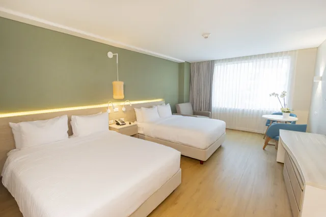 غرفة قياسية بسريرين مزدوجين مع أريكة، Grand Sirenis San Andres 1/1