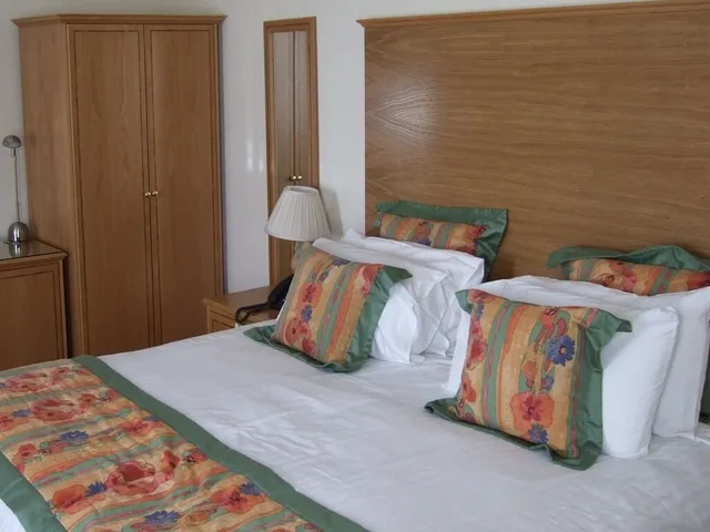 غرفة عائلية بسرير كينج مع أريكة، Horizon Hotel 1/1