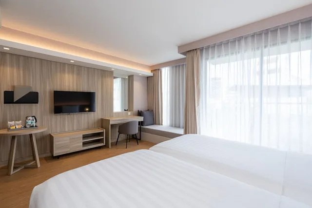 غرفة غراند ديلوكس بسريرين منفصلين وسرير كينج، Aster Hotel And Residence Pattaya 3/5