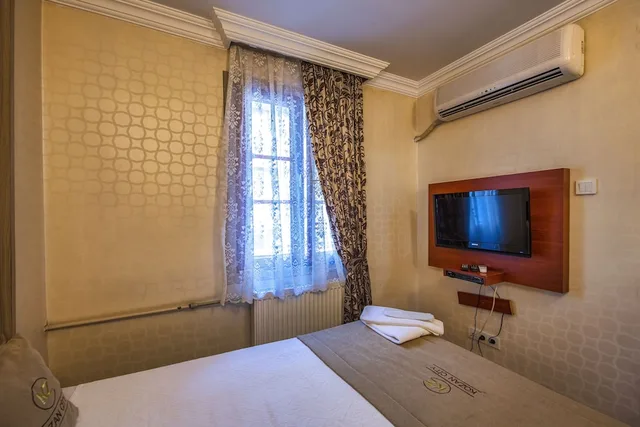 غرفة اقتصادية مفردة بسرير مزدوج، Kozan City Hotel 1/6