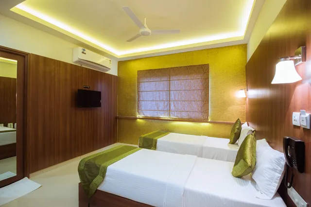 غرفة قياسية بسريرين منفصلين، Treebo Arastu Inn 4/7