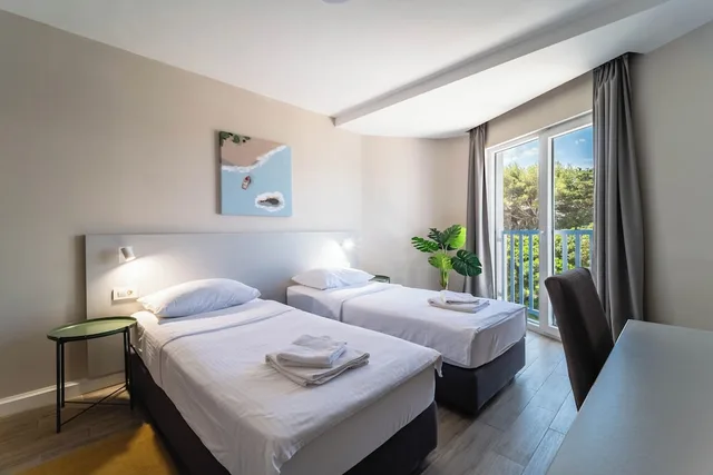غرفة قياسية بسريرين منفصلين، Hotel Plaza 2/8