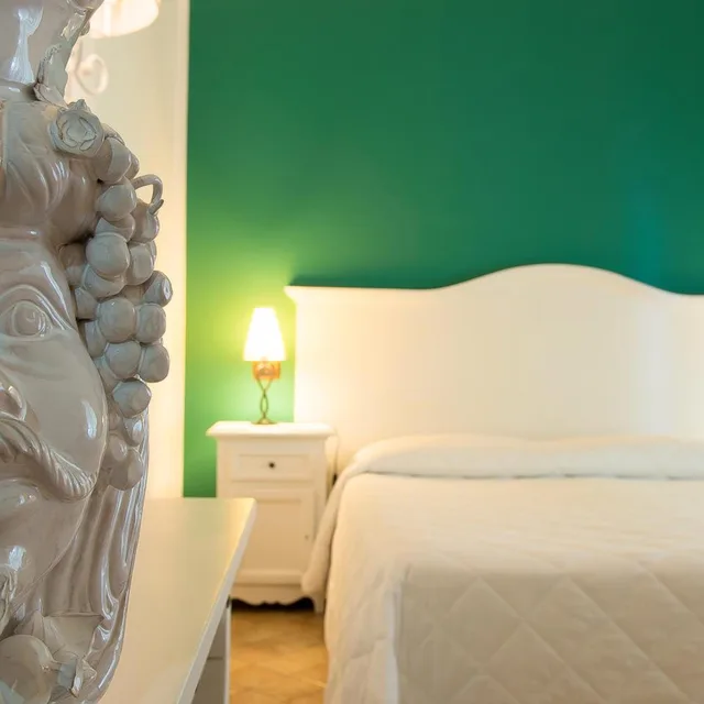غرفة كلاسيكية ثلاثية بإطلالة على الحديقة، Villa Enrica 2/5
