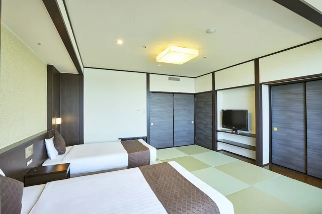 غرفة يابانية بسريرين منفصلين وفرشتي فوتون، KAMENOI HOTEL Oarai 1/4