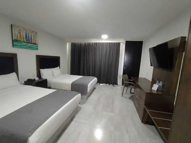 غرفة رباعية بسريرين مزدوجين، HOTEL HACIENDA MAZATLAN 8/10