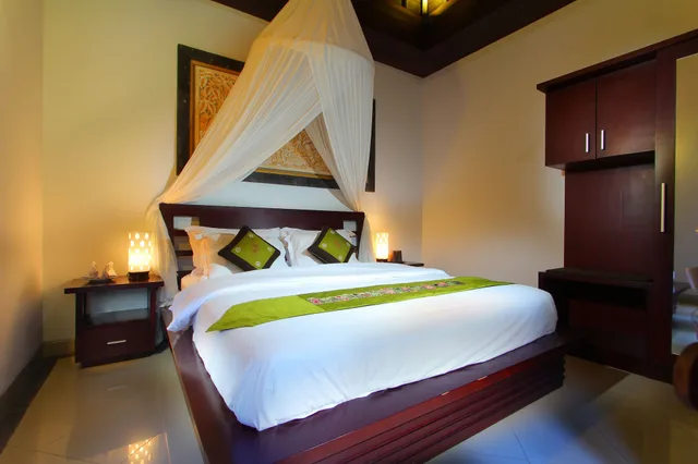غرفة بسريرين منفصلين بشرفة، De Umah Bali Eco Tradi Home 2/4
