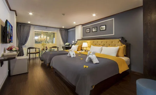 جناح جونيور عائلي بسرير كوين وسرير فردي، Mayflower Hotel Hanoi 1/1