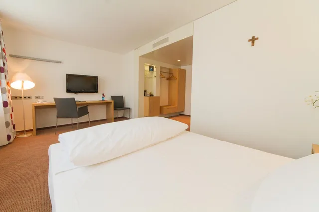 غرفة كومفورت مفردة بسرير كوين، TOP KHR Stadthotel Munster 2/4