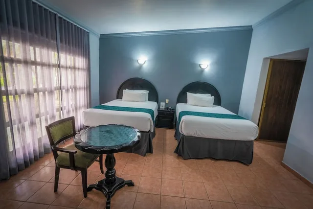 غرفة قياسية بسريرين مزدوجين بإطلالة على الحديقة، InHouse Select Hacienda Tres Rios 10/10