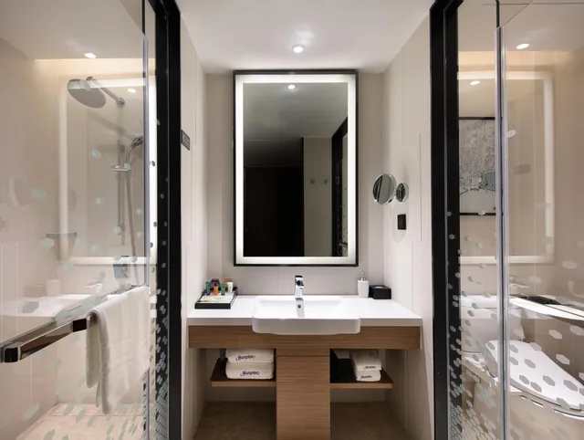 غرفة ديلوكس بسرير كينج وسرير كوين، Hampton by Hilton Guangzhou Tianhe Sports Center 9/10