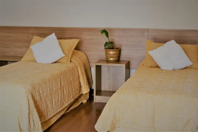 غرفة قياسية رباعية بسرير مزدوج وسريرين منفصلين، HOTEL BOLOGNA CAMPOS DE JORDAO 3/4