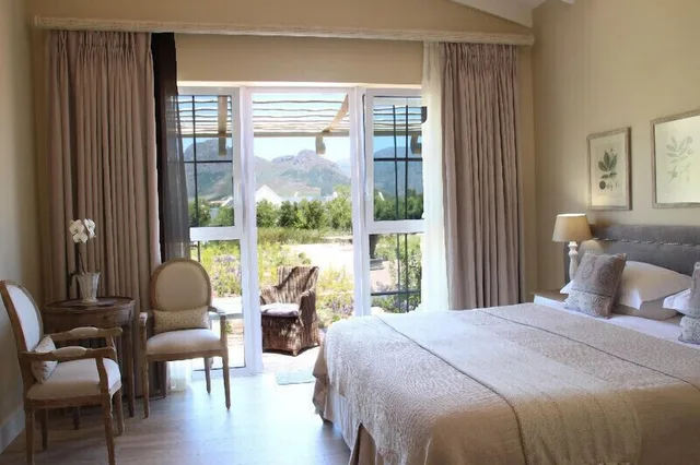غرفة ديلوكس بسرير كينج بإطلالة على الحديقة، La Cabriere Country House 1/4