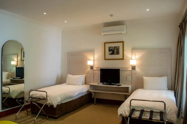 غرفة عائلية بسرير كوين وسريرين منفصلين، Val Du Charron Coach House 9/10