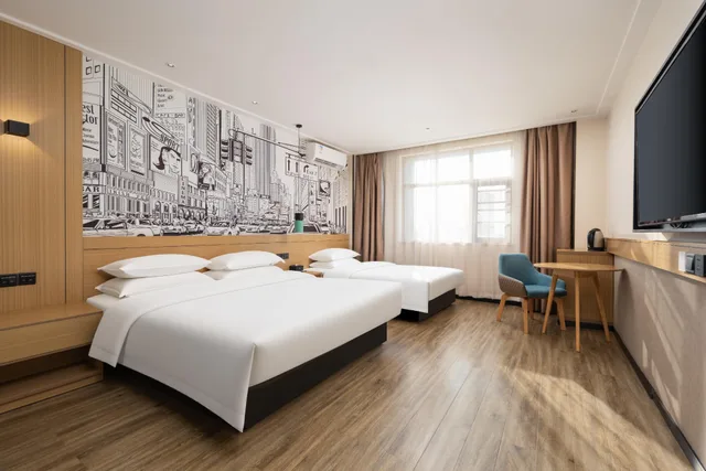 غرفة عائلية بسرير كينج وسرير فردي، City Comfort Inn(Wuhan Caician Square Branch) 1/1