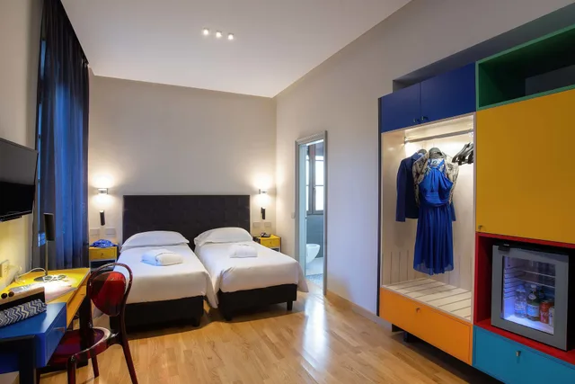 غرفة ثلاثية بسرير كوين وسرير فردي، Albergo Etico Roma 1/2