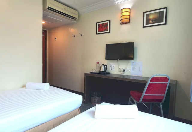 غرفة ديلوكس بسريرين منفصلين، Capital O 90939 Sandakan Central Hotel 3/5