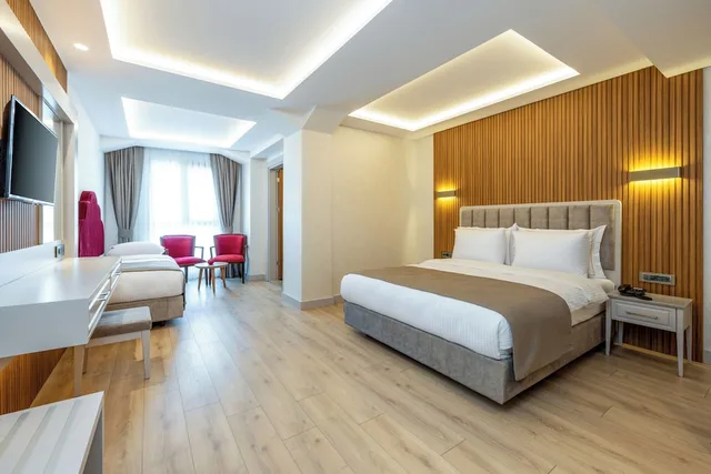 غرفة ديلوكس بسرير كوين، CARINA GOLD HOTEL 1/4