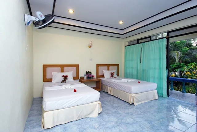Deluxe, Twin Beds, with Fan، Sea Sun Bungalows 1/1