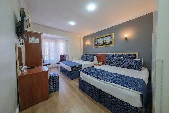 غرفة عائلية بسريرين مزدوجين، Grand Hotel Palmiye 1/10