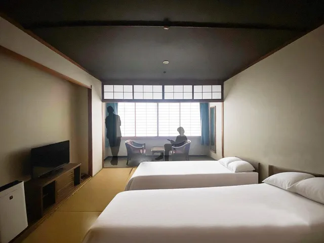 غرفة يابانية بسريرين منفصلين في المبنى الرئيسي، Kujukushima Bayside Hotel & Resort Flags 1/2