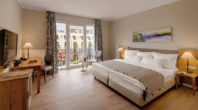 غرفة ديلوكس بسرير كينج بإطلالة على الحديقة بشرفة، Hotel Villa Toskana 1/4