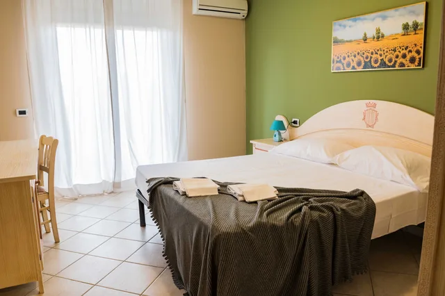 شقة كومفورت بسرير كوين وسريرين منفصلين بغرفتي نوم مع أريكة، Le Residenze Di Santa Costanza 8/10