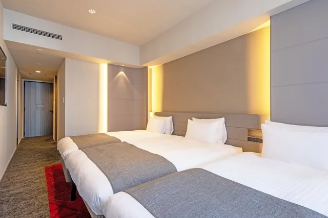 غرفة سوبيريور ثلاثية بسريرين منفصلين وثلاثة أسرّة مع سرير إضافي، Hotel JAL City Fukuoka Tenjin 1/3