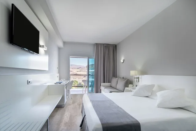 غرفة ديلوكس ثلاثية بسرير فردي، Caserio Hotel 2/4