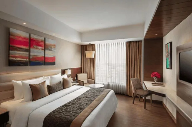 جناح بسرير مزدوج بمنطقة جلوس، Nirvana Sarovar Portico Gorakhpur 1/5
