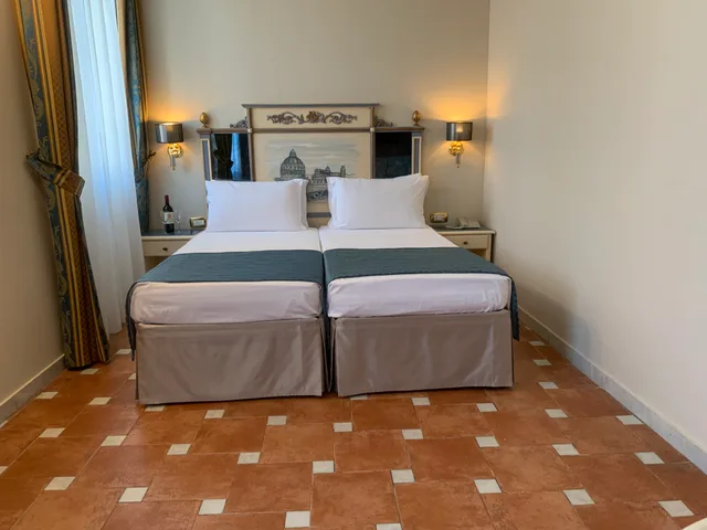 غرفة قياسية بسرير مزدوج أو سريرين منفصلين، Hotel Donatello 1/3