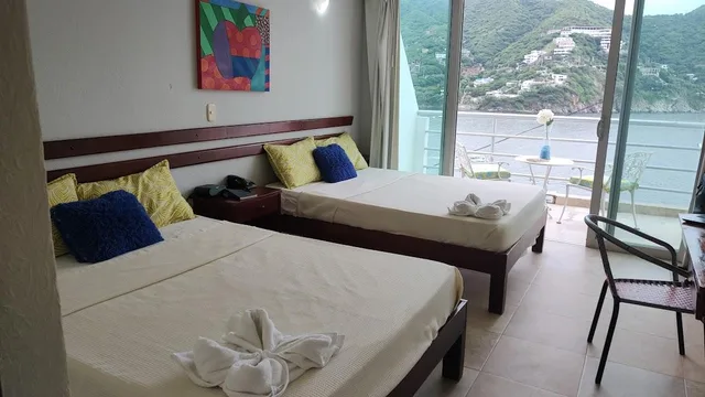 غرفة سوبيريور رباعية بإطلالة على البحر، Hotel Bahia Taganga 1/5