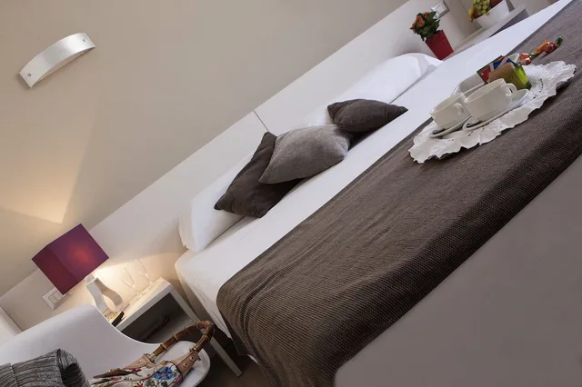 غرفة رباعية بأربعة أسرّة، Mennini Hotel 7/10