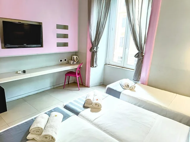 غرفة بثلاثة أسرّة مع سرير إضافي، Manin Suites 2/8