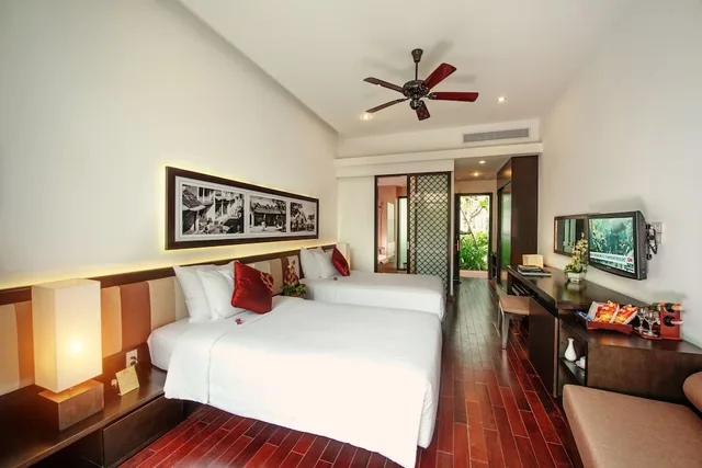 غرفة ديلوكس بسرير كينج بإطلالة على الحديقة، Hoi An Beach Resort 1/2