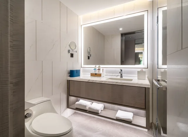 غرفة بسريرين منفصلين بإطلالة على الحديقة مع أريكة، Huidong Business Hotel 3/4