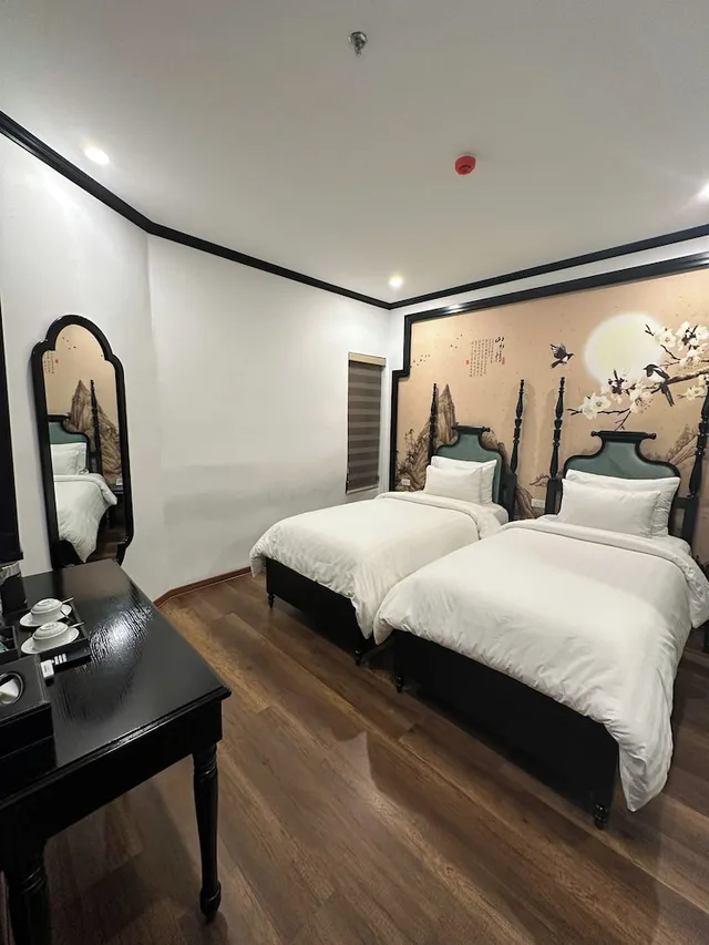 غرفة ديلوكس رباعية بسرير كينج وسريرين منفصلين، Aquarius Premium Hotel 4/7